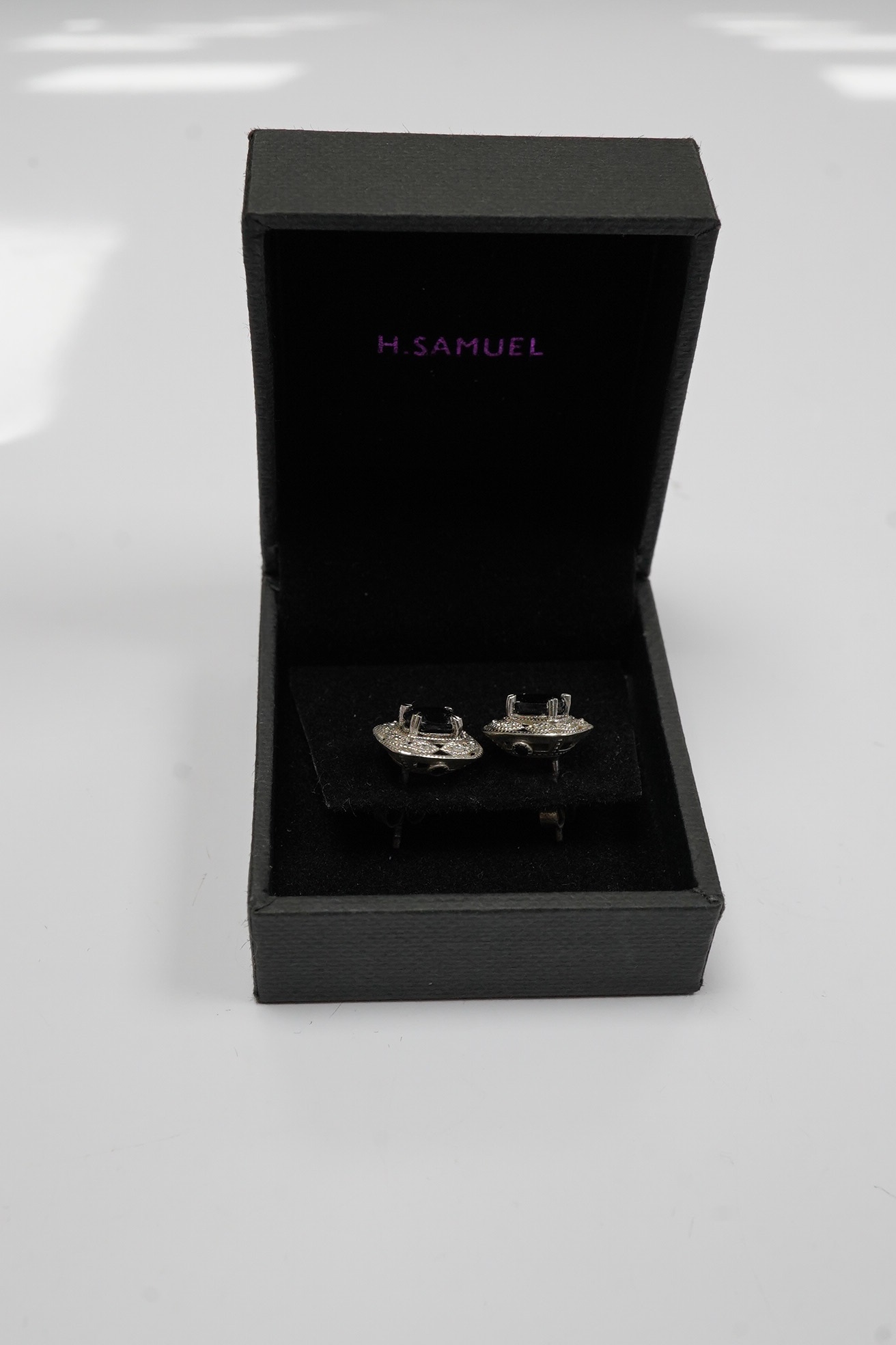 A modern pair of 925, sapphire and diamond set ear studs. Condition - fair to good